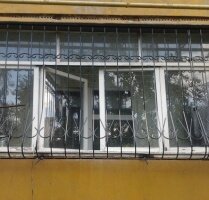 Выгнутая решетка на лоджию